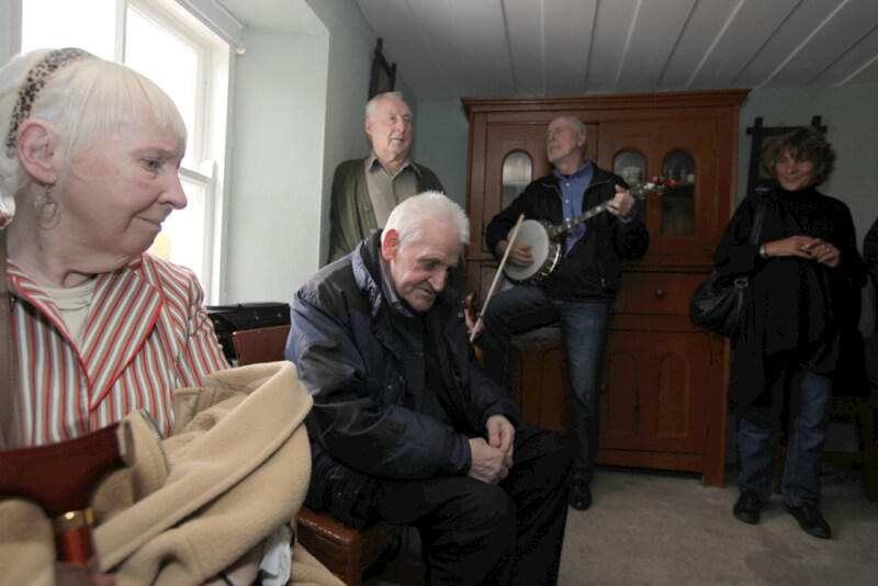 Denis McGowan singing at music session in SeÃ¡n MacDiarmada's house Kiltyclogher